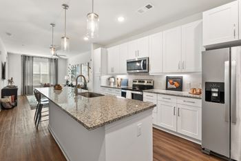Designer kitchen with stainless steel appliances